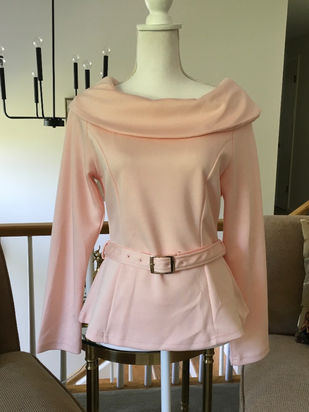 Peachy-pink stretchy top with a side zip and belt with a cowl neckline